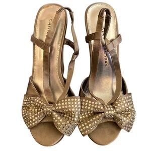 Sparkly platforms with bows, size 7